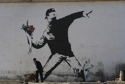 rage flower thrower banksy - one of his most famous artwork to date as of 2025